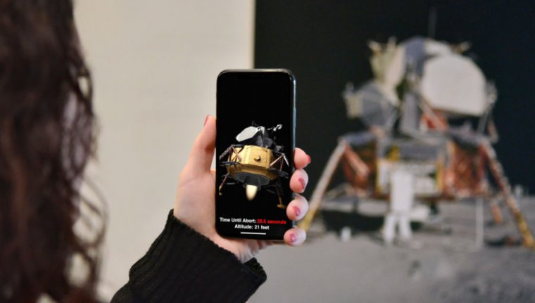 An augmented reality demo by Apple, using a smartphone instead of a headset.