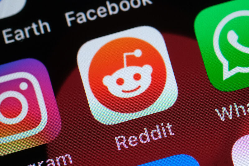 The Reddit app icon on a smartphone screen.